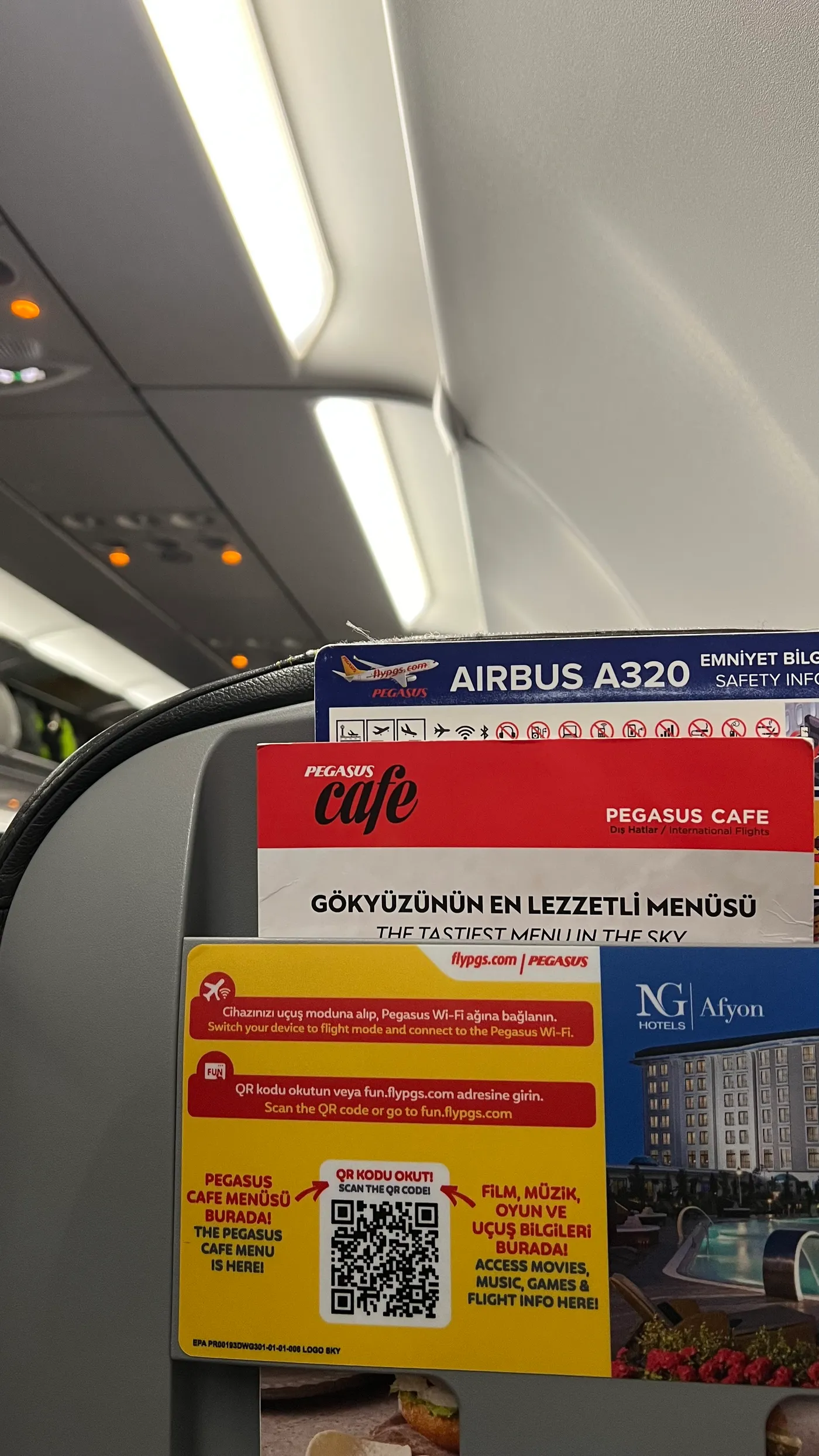 Pegasus Airlines jet at Antalya Airport at night before a flight to Amman, Jordan